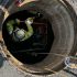 Worker in a Manhole