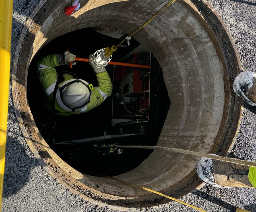 Worker in a Manhole