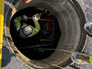 Worker in a Manhole