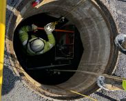 Worker in a Manhole
